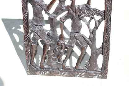 African Village Life Frame with a man carrying Fish and Lady with child. Malawian Dark Iron Wood Detailed Handcarved Wall Art Gifts