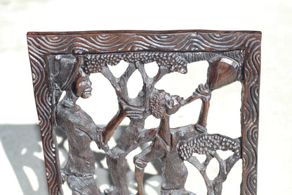 African Village Life Frame with a man carrying Fish and Lady with child. Malawian Dark Iron Wood Detailed Handcarved Wall Art Gifts