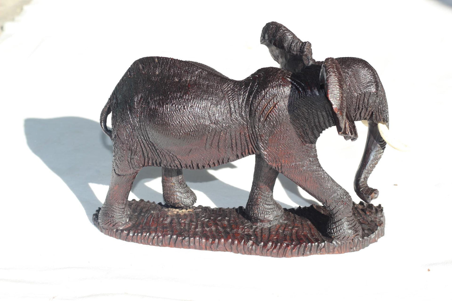 Ironwood handcarved Walking Elephant on a wooden base. Detailed skin dark brown Sculpture. Zimbabwe/African Art Décor gift ready to Ship