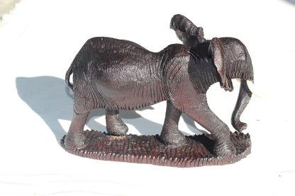 Ironwood handcarved Walking Elephant on a wooden base. Detailed skin dark brown Sculpture. Zimbabwe/African Art Décor gift ready to Ship