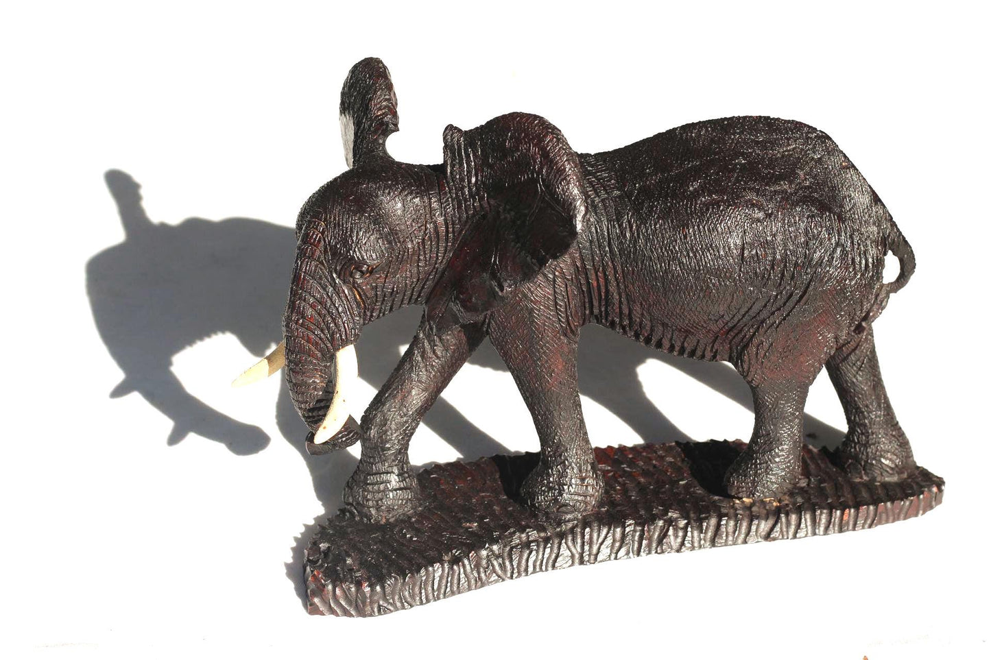 Ironwood handcarved Walking Elephant on a wooden base. Detailed skin dark brown Sculpture. Zimbabwe/African Art Décor gift ready to Ship