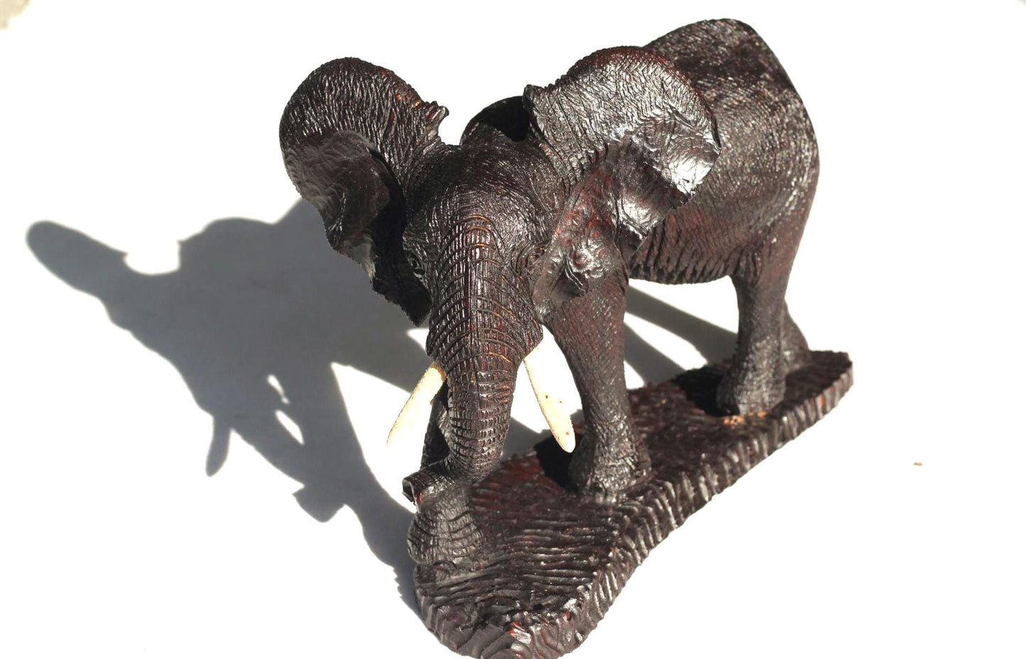 Ironwood handcarved Walking Elephant on a wooden base. Detailed skin dark brown Sculpture. Zimbabwe/African Art Décor gift ready to Ship