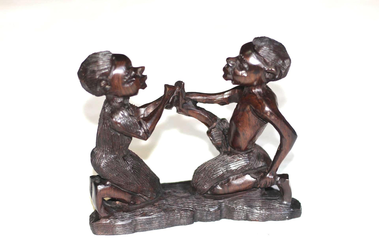 African Village Couple love story. Wife helps husband by removing thorns after working. Handmade Ironwood African Art Sculptures/Figurines.