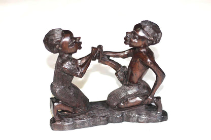 African Village Couple love story. Wife helps husband by removing thorns after working. Handmade Ironwood African Art Sculptures/Figurines.
