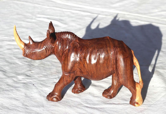 Smooth handcarved multi coloured Ironwood Rhino Sculpture. Zimbabwean lifelike Safari Animals Decor figurine. Unique African Art gift.
