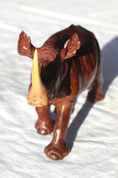 Smooth handcarved multi coloured Ironwood Rhino Sculpture. Zimbabwean lifelike Safari Animals Decor figurine. Unique African Art gift.