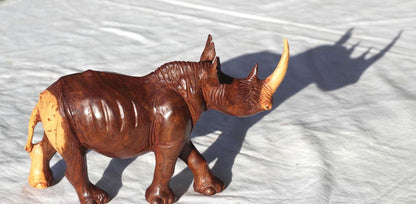 Smooth handcarved multi coloured Ironwood Rhino Sculpture. Zimbabwean lifelike Safari Animals Decor figurine. Unique African Art gift.