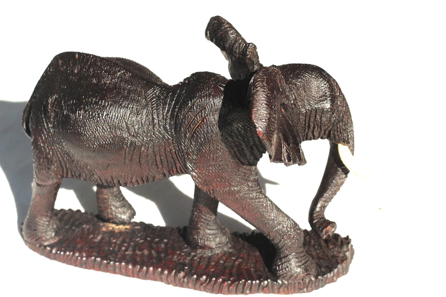 Ironwood handcarved Walking Elephant on a wooden base. Detailed skin dark brown Sculpture. Zimbabwe/African Art Décor gift ready to Ship