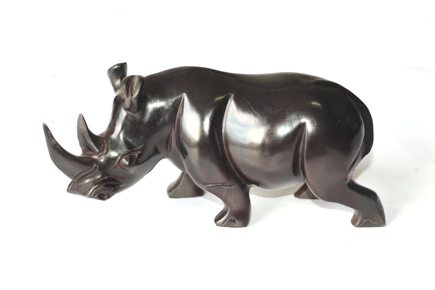 Black Ebony wood Zambian Handcarved Rhino decor Sculpture.  African art gifts ready to Ship Worldwide. Available in different Sizes