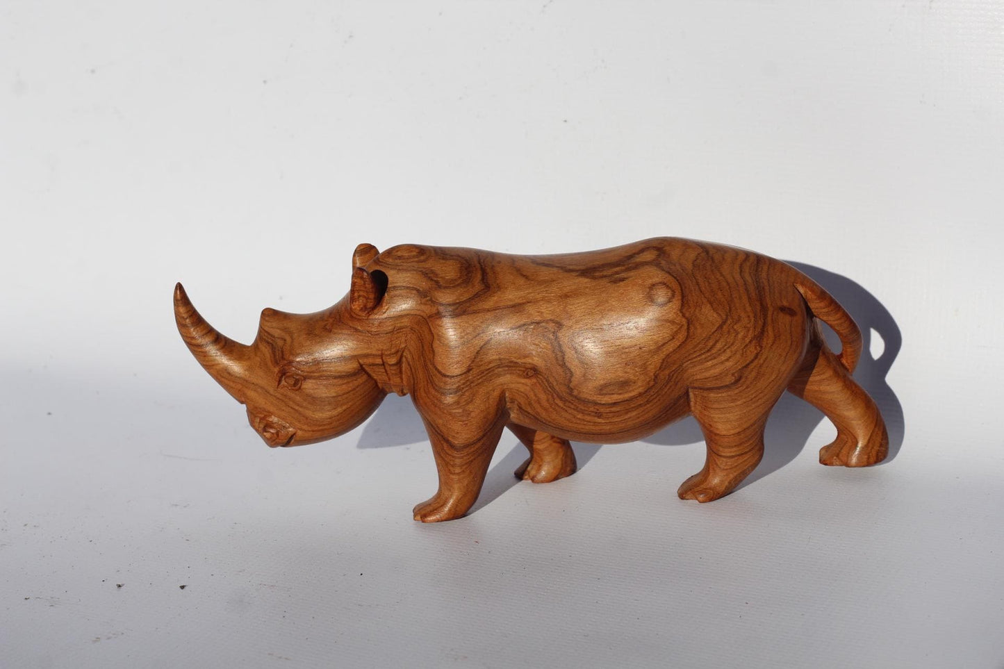 Carved Olive Wood Fine Art Rhino figurine with unique amazing wood grain. Decor Sculptures. African handcarved gifts. Zimbabwe Art